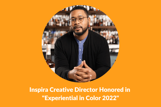 A photo of a handsome man in glasses and a beard: Treasure Neal. The title over it is "Inspira Creative Director Honored in Experiential in Color 2022