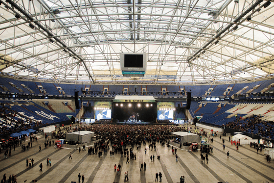 A huge arena being used for a convention on the floor. Title: “Getting Ahead of Your Sponsorship or Live Event (Part2)”