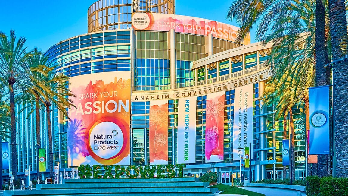 The front of the Anaheim Convention Center, displaying banners for Expo West
